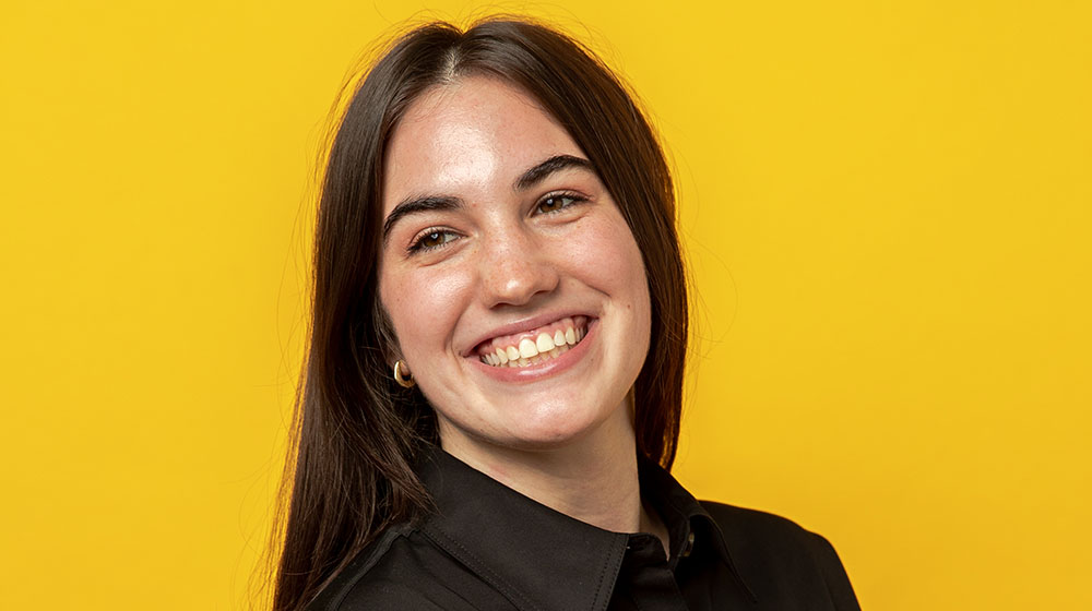 Headshot of Catie Plank smiling, looking over her right shoulder Headshot of Catie Plank smiling, looking over her right shoulder